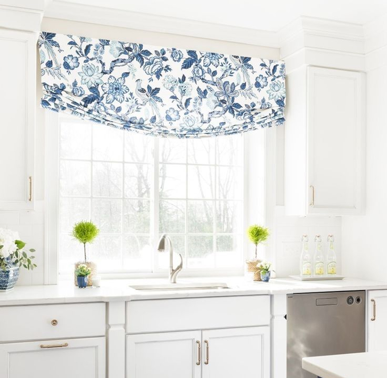 Blue floral window valance in a bright kitchen